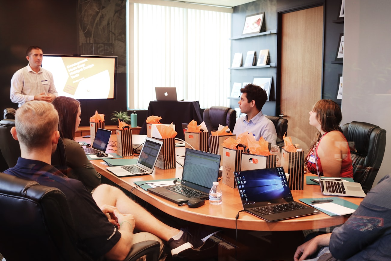 Team gathered in a training room workshop